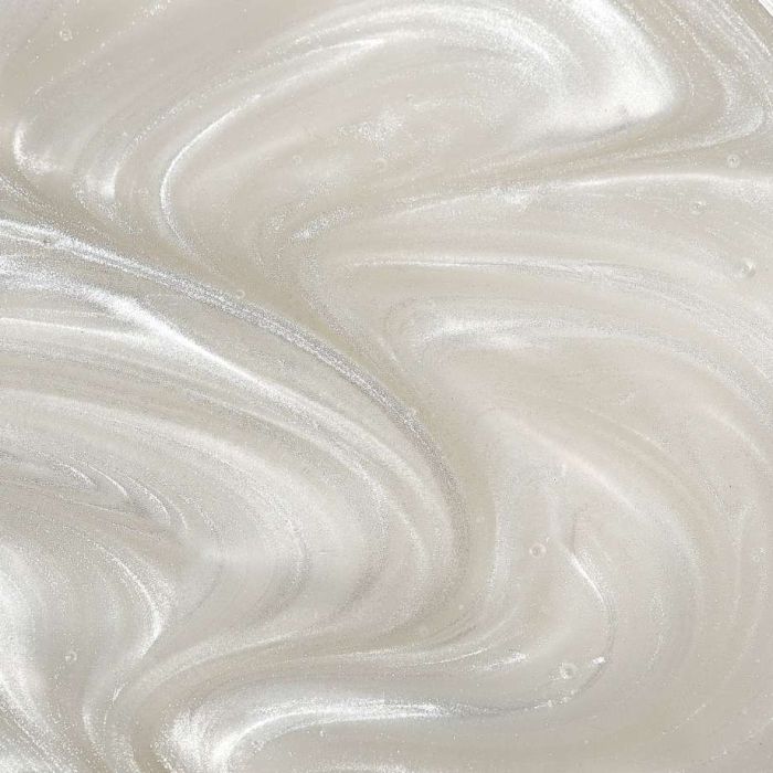 Close up texture swatch of melted HD Brows Hard Wax Opal White