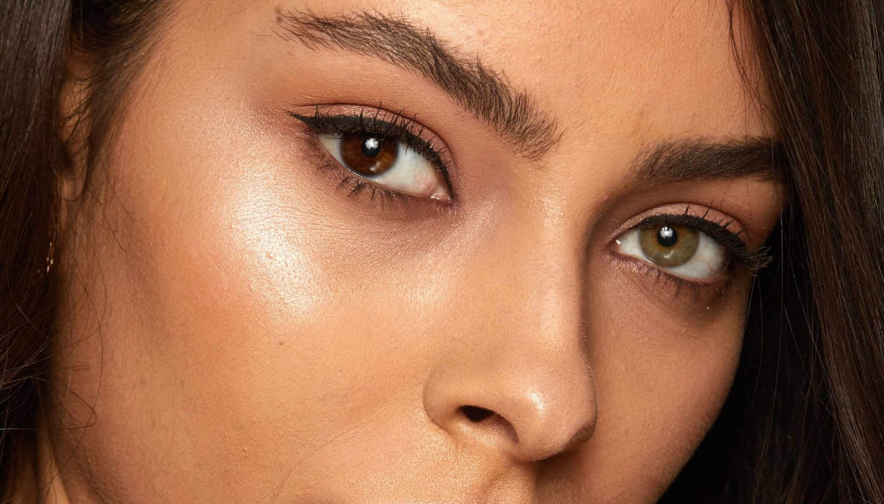 Close up image of model’s eyebrows and eyes