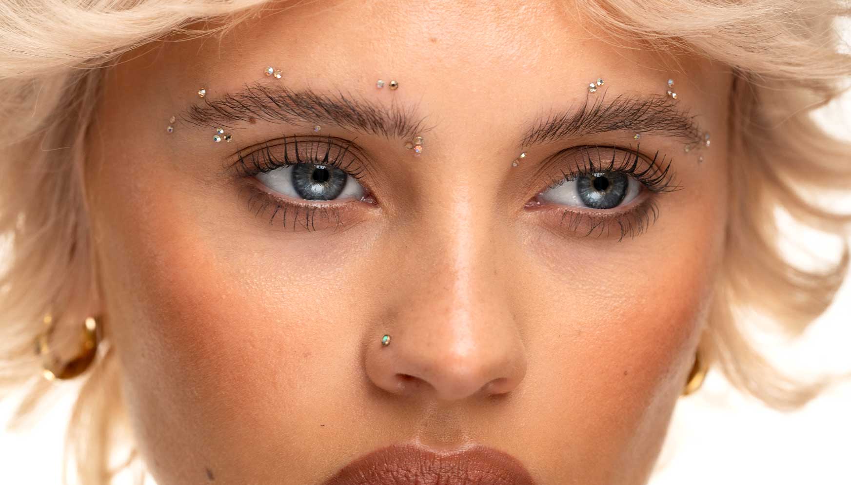 Close up image of model’s eyebrows and eyes