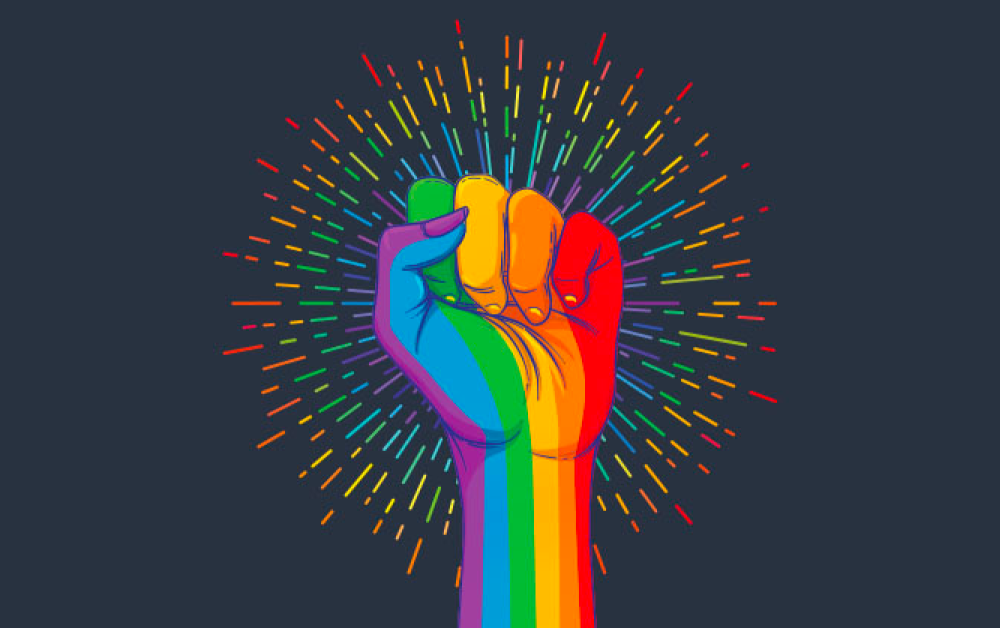 Power fist in rainbow colours to show support for pride month
